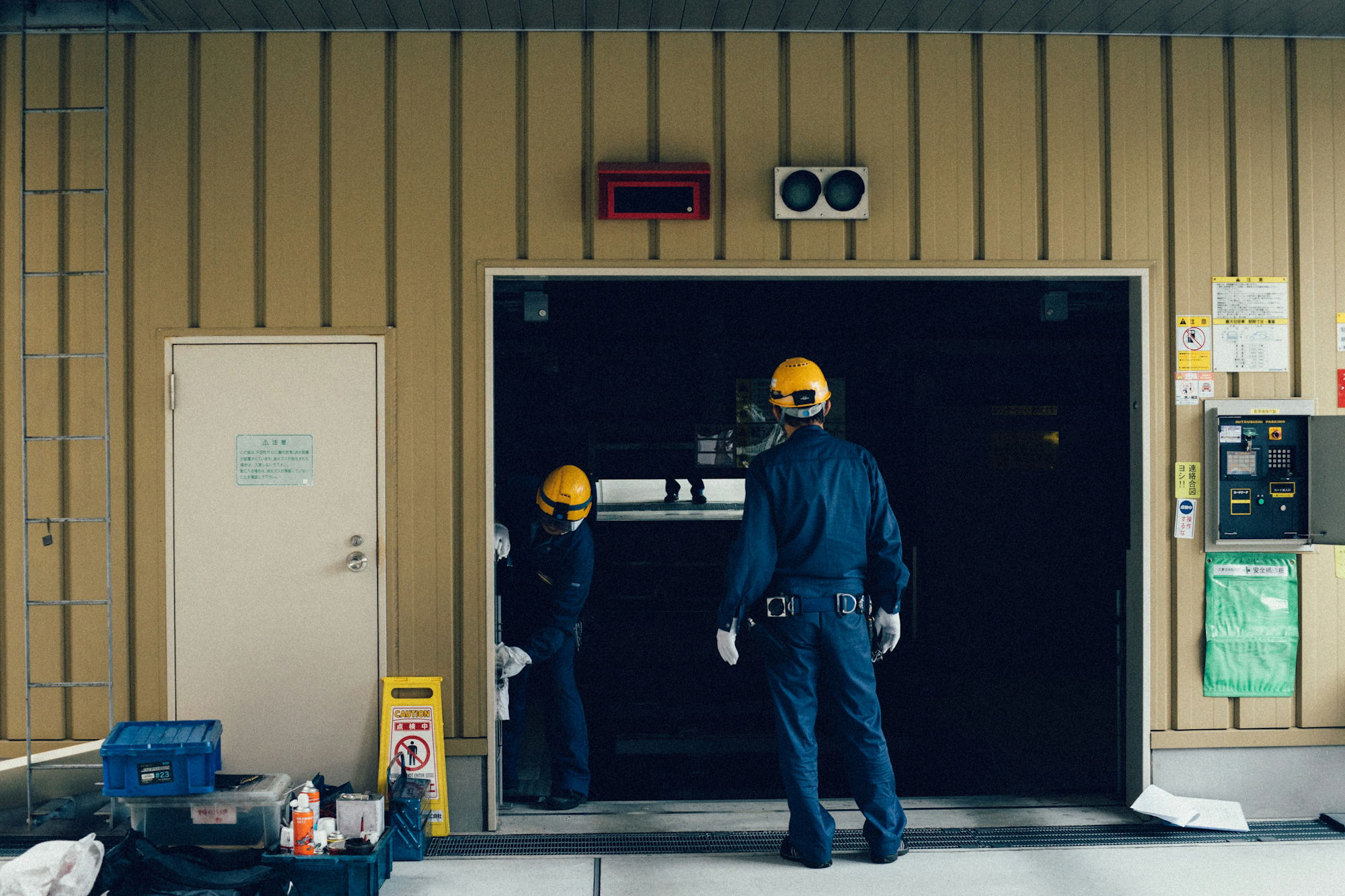 man-standing-in-front-of-open-doorway.jpg man standing in front of open doorway